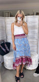 STEVIE HI LOW TIERED MAXI SKIRT IN BLUE FLORAL