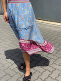 STEVIE HI LOW TIERED MAXI SKIRT IN BLUE FLORAL