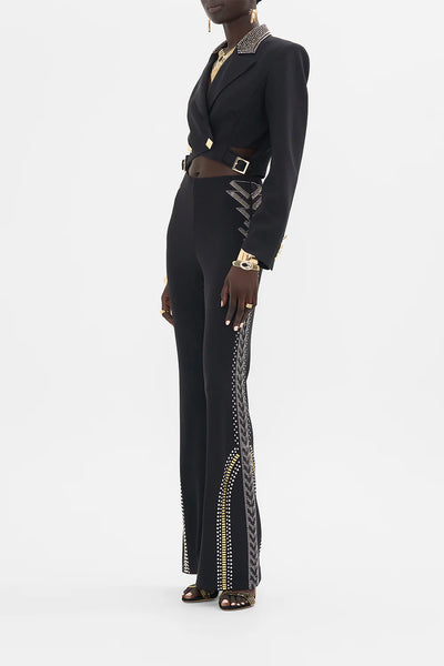 CAMILLA THEY CALL HER NEFERTARI JERSEY FLARE PANT IN BLACK / GOLD