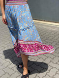 STEVIE HI LOW TIERED MAXI SKIRT IN BLUE FLORAL