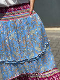 STEVIE HI LOW TIERED MAXI SKIRT IN BLUE FLORAL